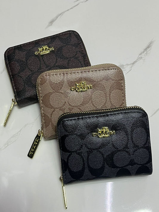 Monedero Coach 1:1