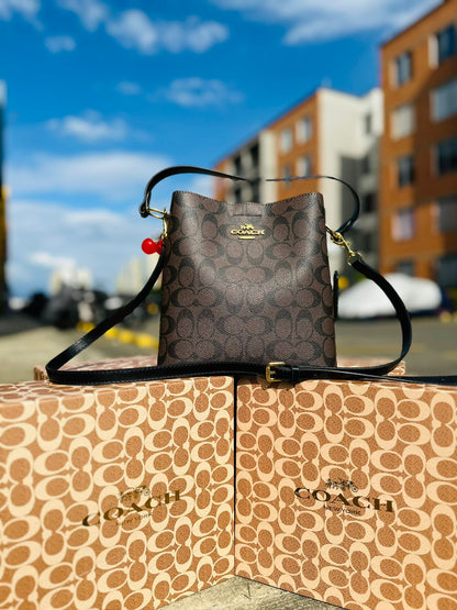 Tula Coach En caja y funda